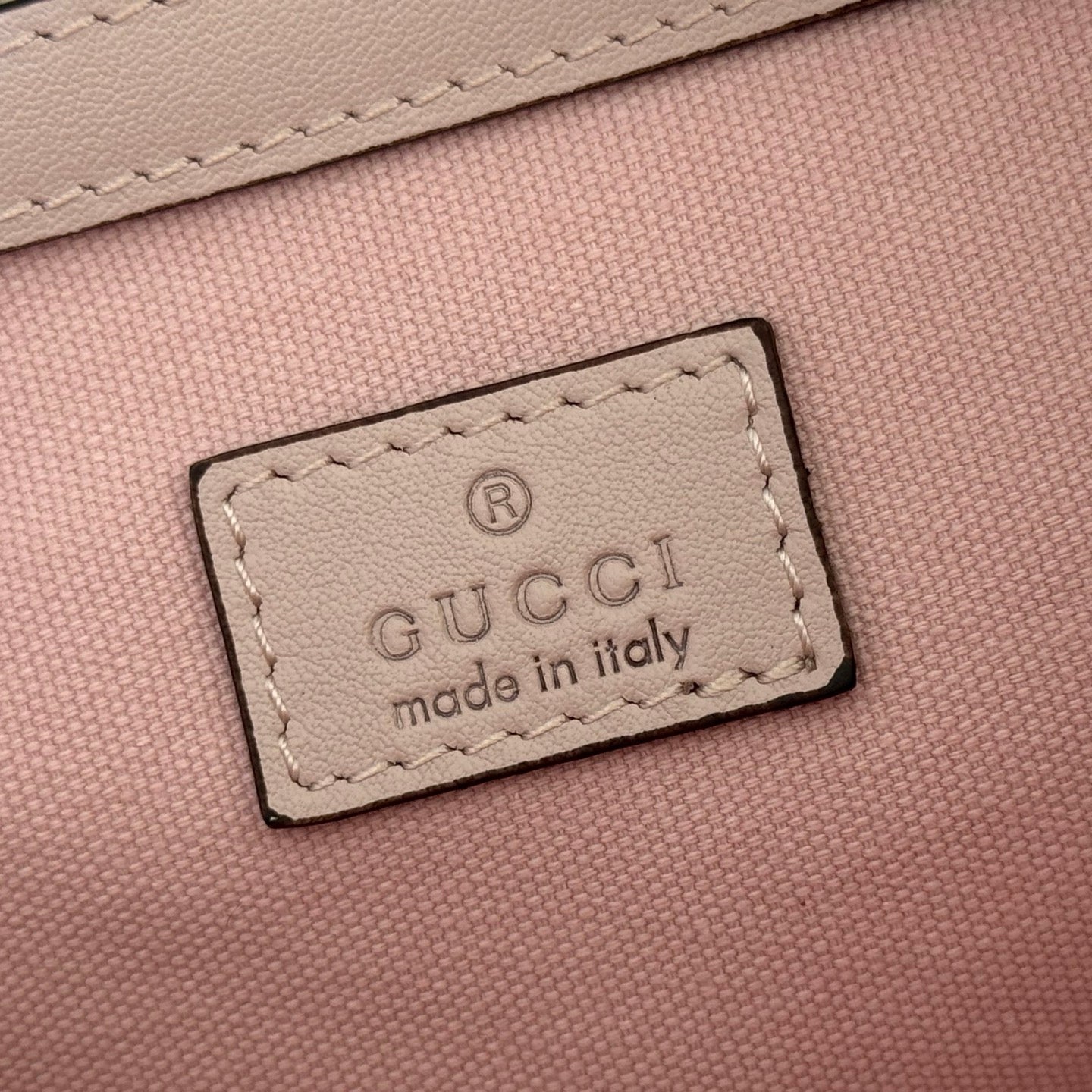 GUCCI 26S EMBLEM BUCKET BAG 25 IN LIGHT PINK COATED FABRIC