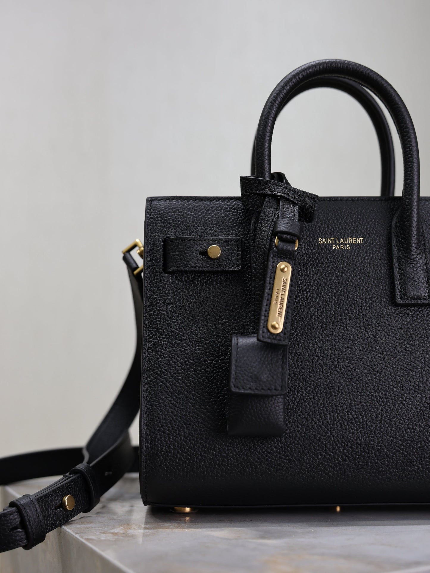 YSL 25S SAC DE JOUR 22 IN BLACK SUPPLE GRAINED CALFSKIN GOLD HARDWARE