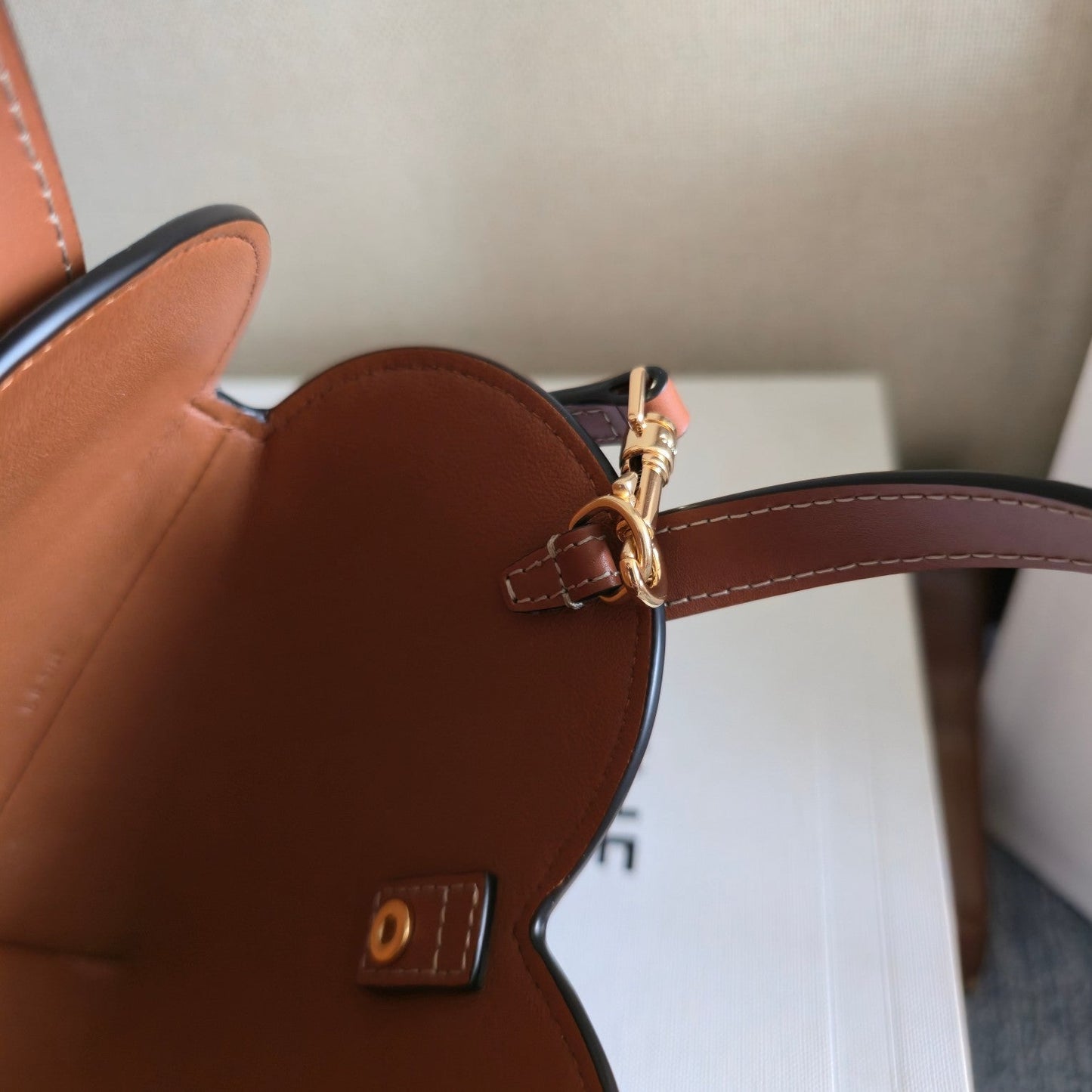CELINE 25S TEEN COEUR BAG 19 MM IN BLACK TRIOMPHE CANVAS AND TAN CALFSKIN