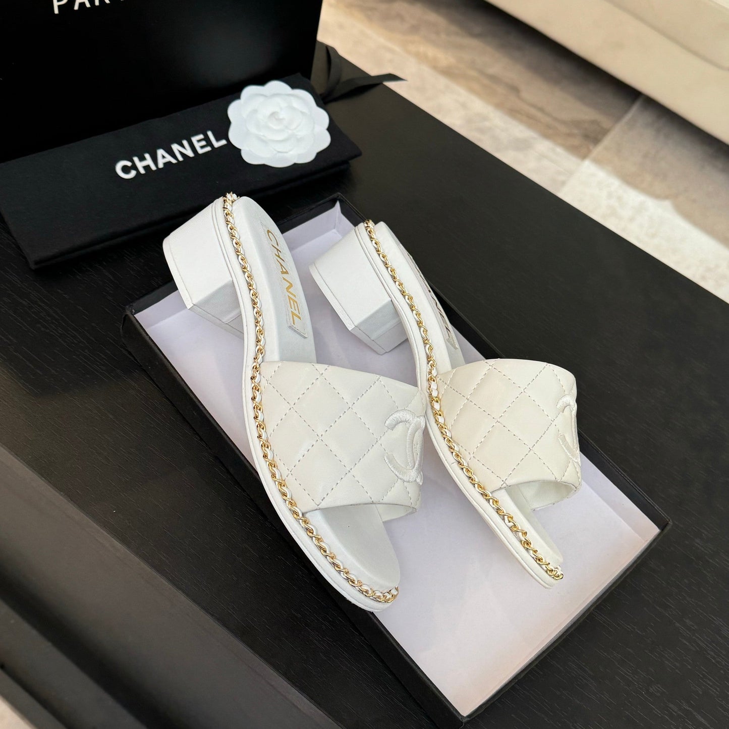 CHANEL HIGH FLATFORM SLIPPER IN WHITE EMBOSSED SHEEPSKIN
