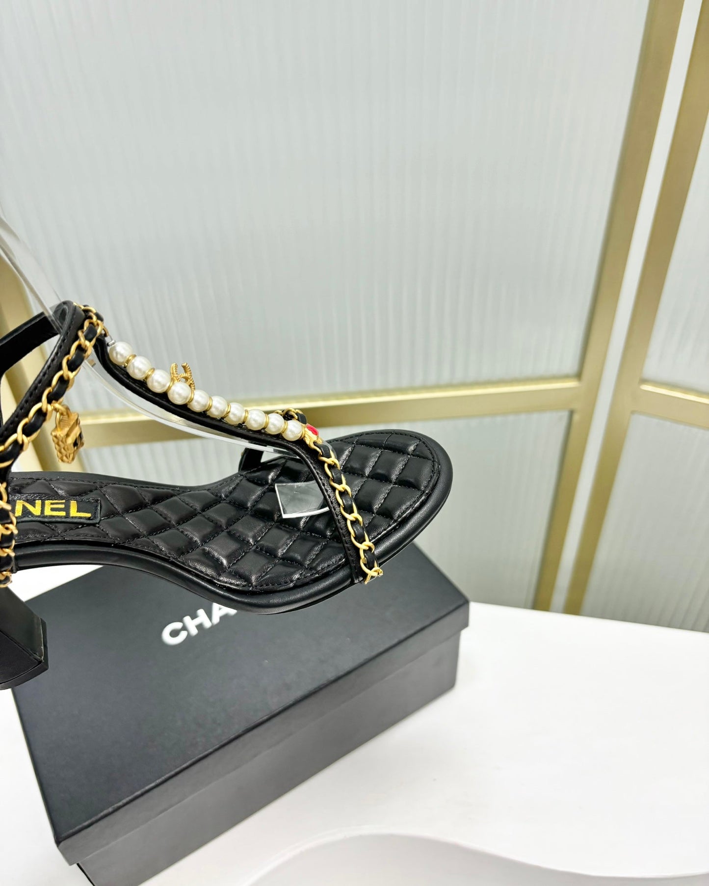 CHANEL HIGH HEELS PEARL CHAIN IN BLACK COWHIDE