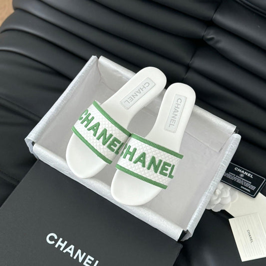 CHANEL Woven Embroidered Letter Slippers White Green