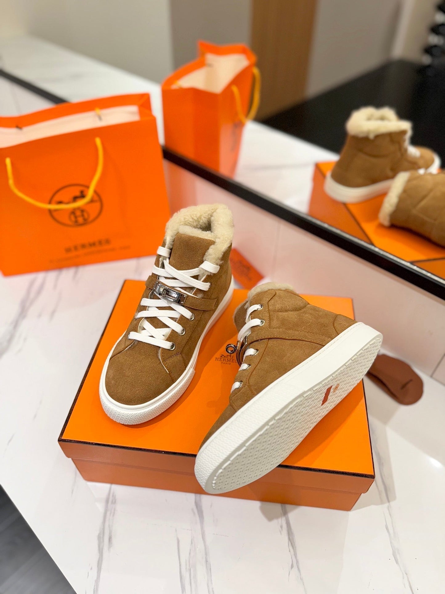 HERMES CHEALSEA BOOTS IN BRONZE BROWN SUEDE AND FLEECE LINING